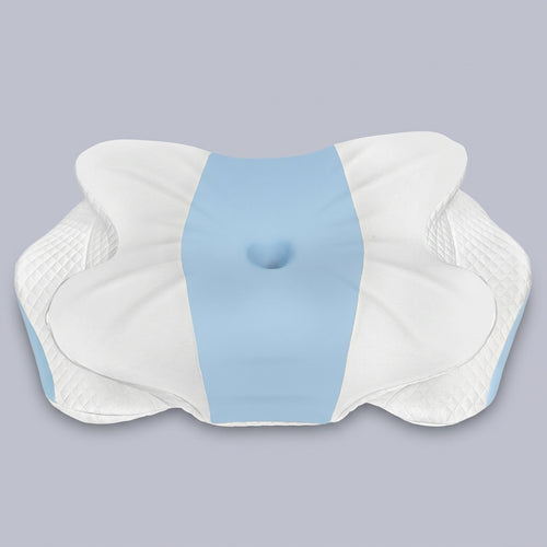 Almohada cervical de cuello en forma de mariposa Ala, sobre fondo liso de estudio